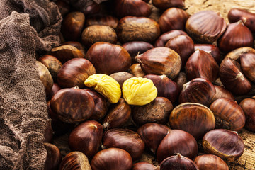 Roasted chestnuts served on an old table