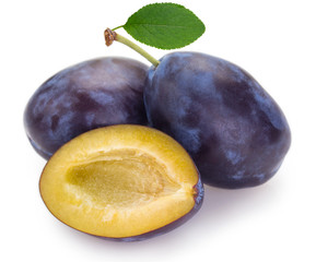 Fresh plums on white background
