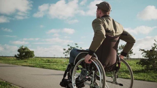 Disabled man alone in the street