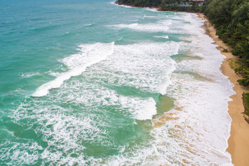 Sea wave on white sand beach turqouise water