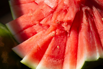 A closeup shot of a sliced watermelon.