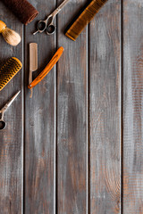 Men's shaving accessories on dark wooden background top view space for text