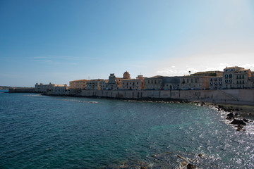 The sea wall protecting the island of Ortygia at Syracuse on the Italian island of Siciy