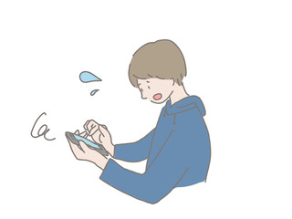 スマホを持った男の子　焦る