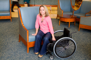 Woman in Wheelchair Transferring to Chair Part 2/3