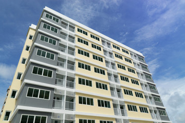Modern apartment building at blue sky