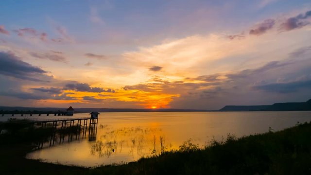 Day to night time lapse of sunset at Lum Chae dam, Khonburi, Nakhon Ratchasima, Thailand