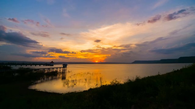 Day to night time lapse of sunset at Lum Chae dam, Khonburi, Nakhon Ratchasima, Thailand