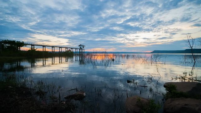 Day to night time lapse of sunset at Lum Chae dam, Khonburi, Nakhon Ratchasima, Thailand
