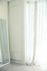 Idea of décor in white clean room in mirror decorate.