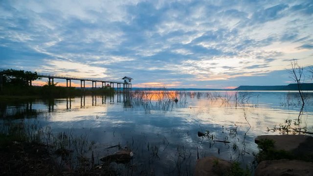 Day to night time lapse of sunset at Lum Chae dam, Khonburi, Nakhon Ratchasima, Thailand