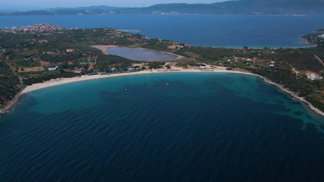 Aerial footage of Ouranoupoli coastline in Athos in Halkidiki during sunny day
