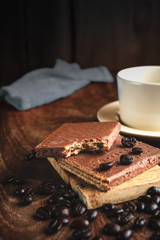 Chocolate coated wafer filled with cream. 
