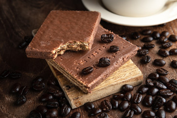 Chocolate coated wafer filled with cream. 