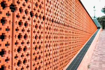 orange geometric wall fence. oriental ornament background
