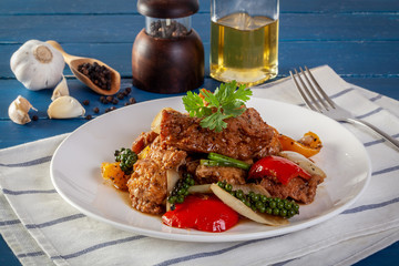  Fried fish with vegetables in black pepper sauce