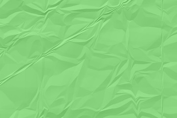 crumpled green paper background close up