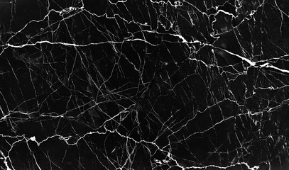 Black marble nature texture with white cracked in seamless patterns abstract for dark background