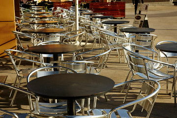 empty tables and chairs
