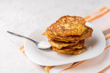 a stack of pancake cheesecakes in the plate