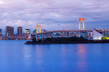Fototapeta na wymiar Odaiba Rainbow bridge with Tokyo bay view at night