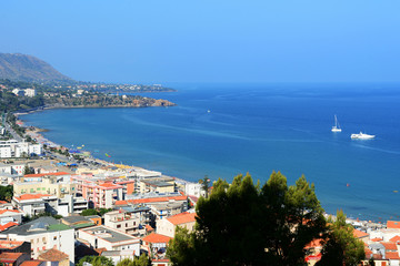 Naklejka premium Beautiful view of Cefalu town from the Rocca di Cefalu in the early morning. Sicily, Italy