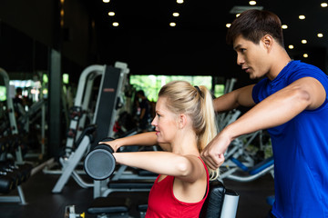 Young couples work out at the gym