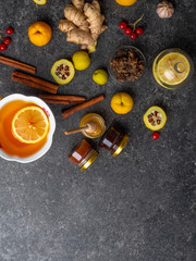 Cup of ginger hot tea with lemon and honey, cinnamon. autumn or winter drink