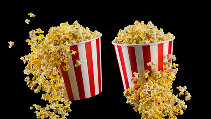 Set of paper striped buckets with popcorn isolated on black background