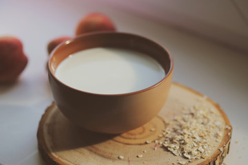 Breakfast useful porridge and sandwiches is on the table