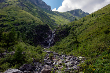 Waterfall. Mountain waterfall. Mountain river. 