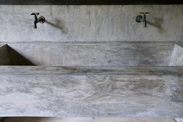 Loft style built from cement and not painted are washbasin with black faucet, Water tap, Copy space, Water consumption concept