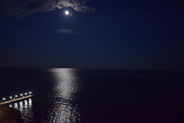 Fototapeta na wymiar night sky over the sea