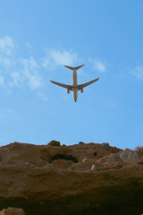 Fototapeta na wymiar Descent of an airplane looks like a crash - concept of business decline