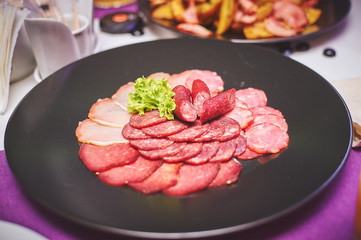 Colorful and appetizing cold cuts and salads