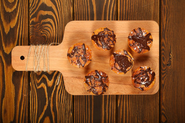 cake of rice flour with nuts and chocolate is on the table