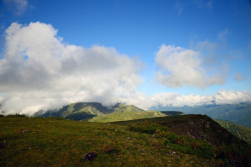  The mountain ranges of Satan and Hamar-Daban. Mountain peaks and valleys. Mountain landscape. The nature of Siberia.