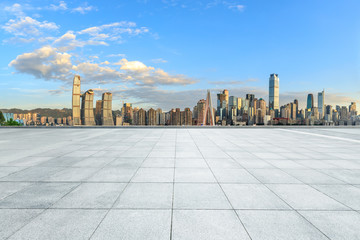 Empty square floor and cityscape with buildings in Chongqing at sunset,China.