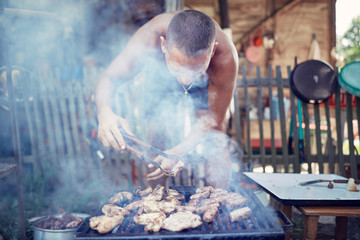 Barbecue making outdoors on a regular / vintage grill.