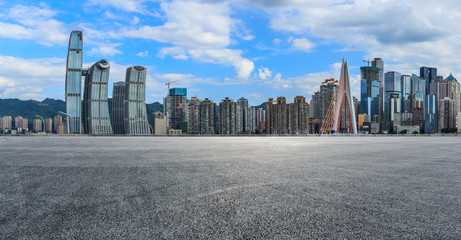 Race track ground and city financial district with buildings in Chongqing,China.