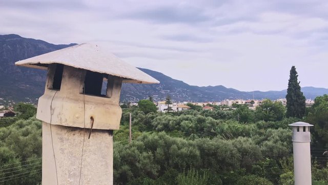 Taigetos Mountain At Peloponesse,Greece With An Old Chimney On The Foreground