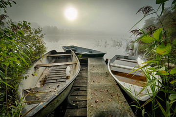 Rowboats on the calm Swedish lake