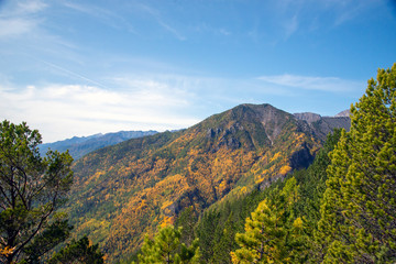  The mountain ranges of Satan and Hamar-Daban. Mountain peaks and valleys. Mountain landscape. The nature of Siberia.