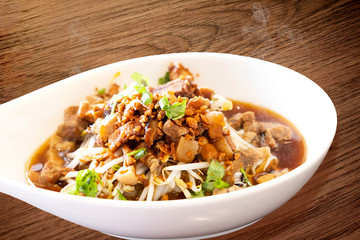 Chinese traditional tube noodles on a wooden table
