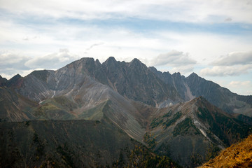  The mountain ranges of Satan and Hamar-Daban. Mountain peaks and valleys. Mountain landscape. The nature of Siberia.