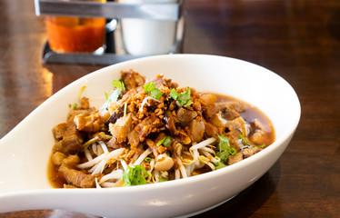 Chinese traditional tube noodles on a wooden table