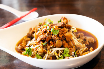 Chinese traditional tube noodles on a wooden table