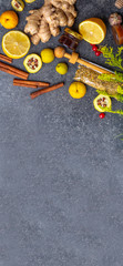 banner of alternative Medicine, ingredients for a spicy warming tea in the winter day, healthy eating concept, herbs, flowers, red berries, cydonia, lemon, ginger. Vitamin C, antioxidants rich food