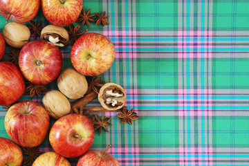 Bright ripe apples forming autumn mood background for design and decoration