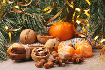 Still life formed with pine branches and New Year sweets